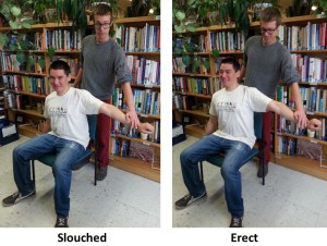 pressing down on arm slouched erect trimmed